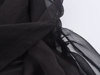 Rock mit verspielten Falten